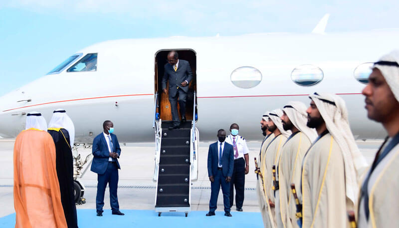 A government official existing a private jet on an official visit booked by Dela World Charter.