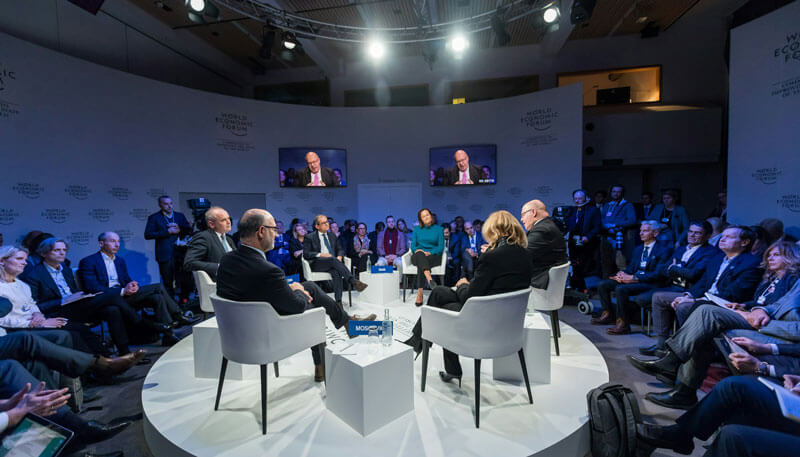People attending a conference or event following a flight organized by Dela World Charter.