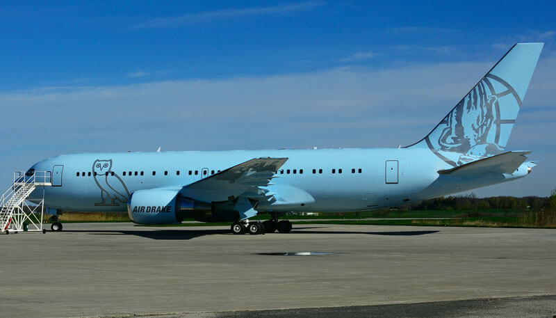 A private aircaft for a music tour charter featuring a customized livery for an artist.