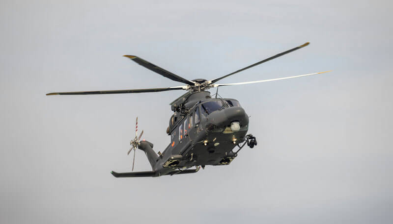 Oil and gas crew members being transported via helicopter by Dela World Charter.