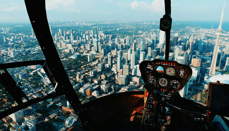 The view from a helicopter on a scenic tour flying over New York City booked by Dela World Charter.
