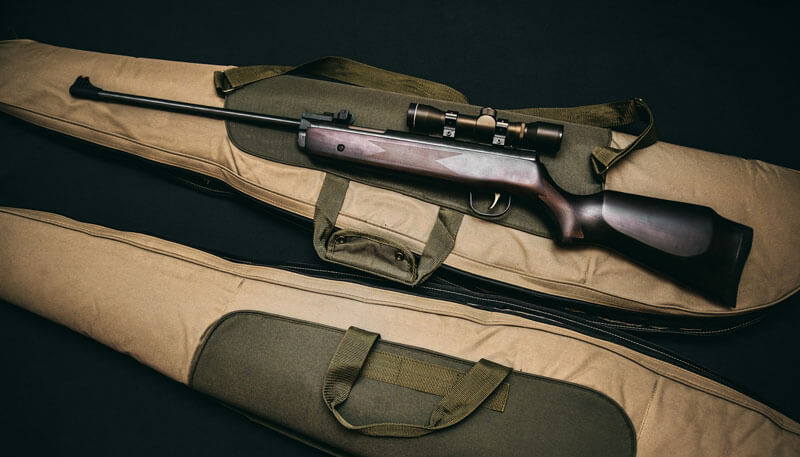 A rifle and case being used on a hunting trip by private jet clients.